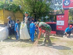Anggota Koramil 02/Enrekang Bersama Siswa SDN 116 Enrekang Bersihkan Lingkungan Sekolah