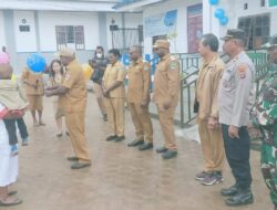PLH DANRAMIL 1703-01/ENAROTALI DAMPINGI BUPATI PANIAI HADIRI KEGIATAN LAUNCHING PEMERIKSAAN KESEHATAN GRATIS (PKG) DI PUSKESMAS ENAEOTALI
