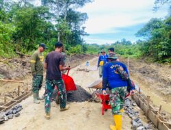Penuh semangat, Satgas TMMD ke 124 Kodim 1502/Masohi timbun jalan tani