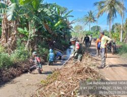 Babinsa Kodim 1404/Pinrang Bersihkan Saluran Irigasi Bersama Warga