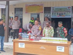 DANRAMIL 1703-01/ENAROTALI HADIRI PEMUSNAHAN BARANG BUKTI ( BB ) MIRAS DI MAPOLRES PANIAI