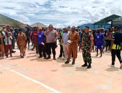 DANRAMIL 1703-01/ENAROTALI HADIRI PEMBUKAAN TURNAMEN BOLA VOLI ANTAR DISTRIK SEKABUPATEN PANIAI DALAM RANGKA HUT RI KE-80 TAHUN 2025