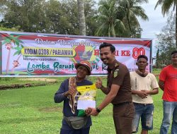 Dalam Rangka Memeriahkan HUT RI ke 80 Tahun, Kodim 0308/Pariaman Menggelar Lomba Beruk Petik Kelapa di Rest Area Belakang Hotel Nan Tongga