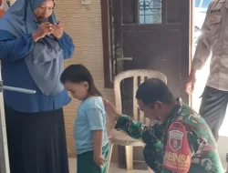 Bantu Kontrol Kesehatan Anak,Babinsa Koramil 0907/03 Tarbar Dampingi Posyandu Diwilayah